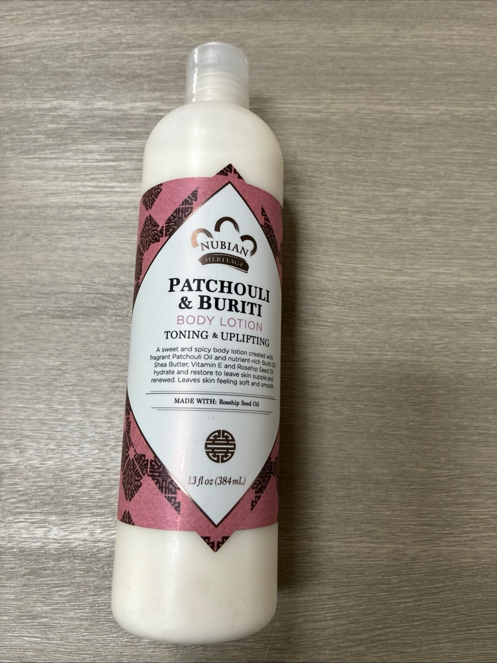 Nubian Heritage Patchouli & Buriti Body Lotion - Pink and White Bottle - Picture 2 of 6